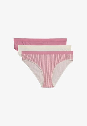 Drie damesbikini's in roze, wit en roze met witte hartjespatronen, horizontaal opgestapeld.