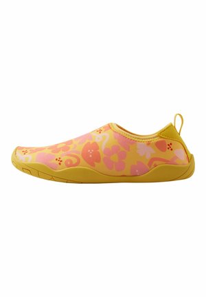 Yellow water shoes with pink floral patterns and a smooth material. Slip-on design with a flexible sole and a small back tab for easy wear.