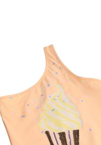 Ροζ μαγιό με ένα λουράκι, διακοσμημένο με μια γραφική απεικόνιση μανία με λευκή κρέμα και πολύχρωμες τρούφες. Λείο, ελαστικό ύφασμα.