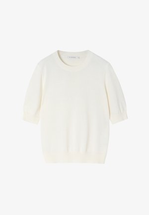 Világos krém színű, rövid ujjú pulóver, puha tapintású, kerek nyakú, bordás mandzsettákkal és szegéllyel, laza szabású, könnyű kötött anyagból készült.