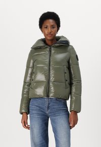 Padded short jacket in glossy olive green with a large collar, zip closure, and black button accents on the front and sleeves.