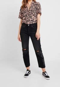 Levi's® Vaqueros rectos - black denim