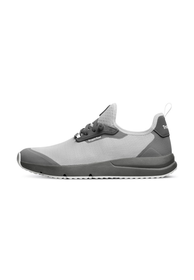 Light gray athletic shoe with a textured mesh upper, gray rubber accents, a pull tab at the heel, and a flexible sole.