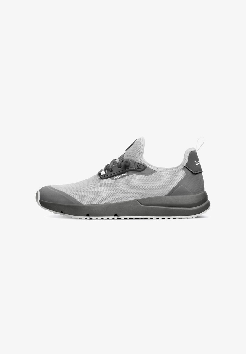 Light gray athletic shoe with a textured mesh upper, gray rubber accents, a pull tab at the heel, and a flexible sole.