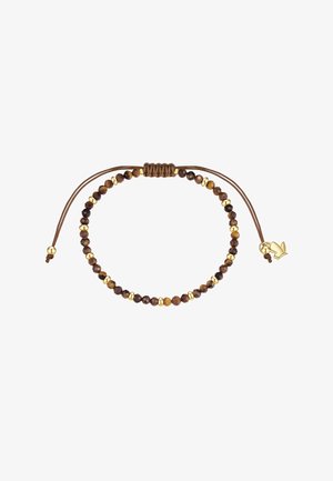 Verstellbares braunes Kordelarmband mit abwechselnd kleinen dunkelbraunen und goldenen Perlen und einem kleinen goldenen Vogelanhänger am Ende einer Kordel.