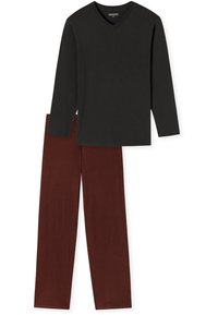 Schwarzes Langarm-V-Ausschnitt-Top, kombiniert mit rot karierten Hosen. Weicher Baumwollstoff, gerade Passform und sichtbare Nähte an den Bündchen.