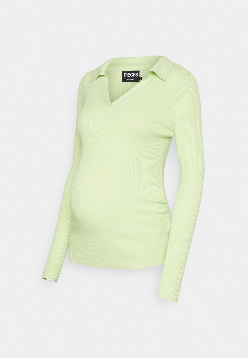 T-shirt de maternidade em verde claro com pregas, mangas longas, colarinho em V e franzidos laterais para um ajuste ajustado à volta da barriga.