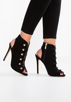 High heeled sandals - black
