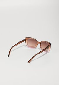 Guess UNISEX beżowy