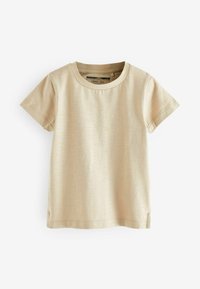 T-shirt beige à manches courtes pour enfant avec encolure ronde, design uni, et coutures visibles aux manches et à l'ourlet.