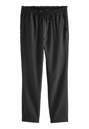 Pantalon de survêtement noir en tissu léger ; doté d'une taille élastique avec cordon de serrage, de poches latérales et de jambes fuselées.