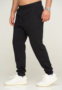 Jack & Jones KANE JJHARRY - Jogginghose - black