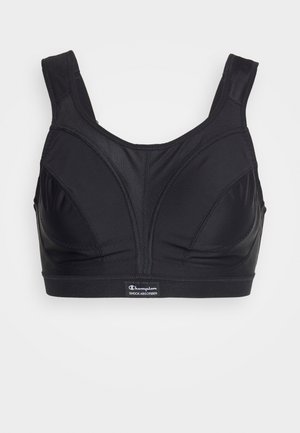 Čierny športový podprsenka vyrobená z hladkej tkaniny, so širokými ramienkami, presne definovaným švom a logom na spodnom okraji.