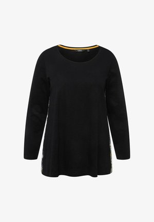 Musta pitkähihaine paita, jossa on pyöreä pääntie ja kontrastivärinen keltainen trimmi kaula-aukossa. Vaatteessa on kuvioidut sivupaneelit lisäyksinä.