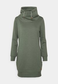 Vihreä hupparitunika, jossa on korkea kaulus, pitkät hihat, sivutaskut ja ribattu helma. Mukana narut, joissa on puuakkeneita.