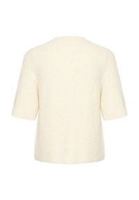 Pulover scurt cu mâneci scurte, de culoare crem, fabricat dintr-un material moale și pufoș. Dispune de o croială lejeră și o guler rotund, fără ornamente.