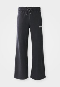 COMUNITY - Tepláky - washed black
