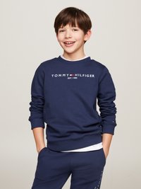 Dunkelblaues Sweatshirt mit gerippten Bündchen und Saum, ausgestattet mit dem weißen "TOMMY HILFIGER EST. 1985" Logo auf der Brust. Hergestellt aus weichem Baumwollmaterial.