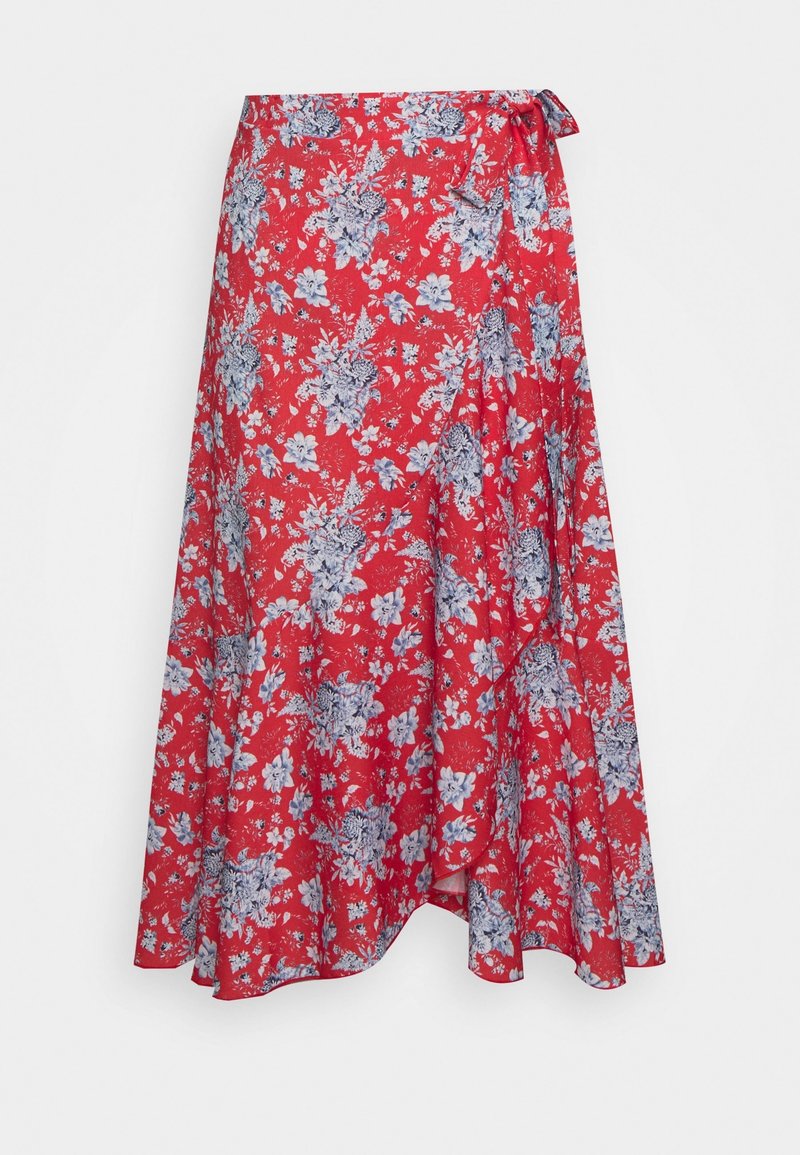 Falda envolvente roja con estampado de flores azules y blancas, fabricada en un tejido ligero, con un dobladillo asimétrico y un cierre de lazo en la cintura.