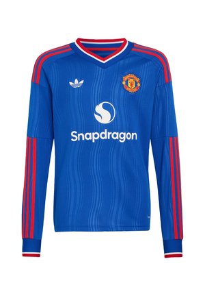 Μπλε ποδοσφαιρική φανέλα Manchester United με μακριά μανίκια, κόκκινες ρίγες στα μανίκια, λευκό λογότυπο Snapdragon και λογότυπο Adidas στο στήθος.