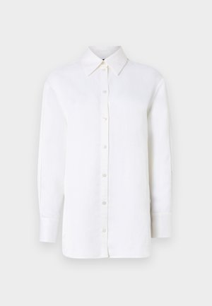 Camicia button-up bianca in lino con colletto a punta, maniche lunghe e chiusure con bottoni. Presenta una vestibilità rilassata e una texture liscia.