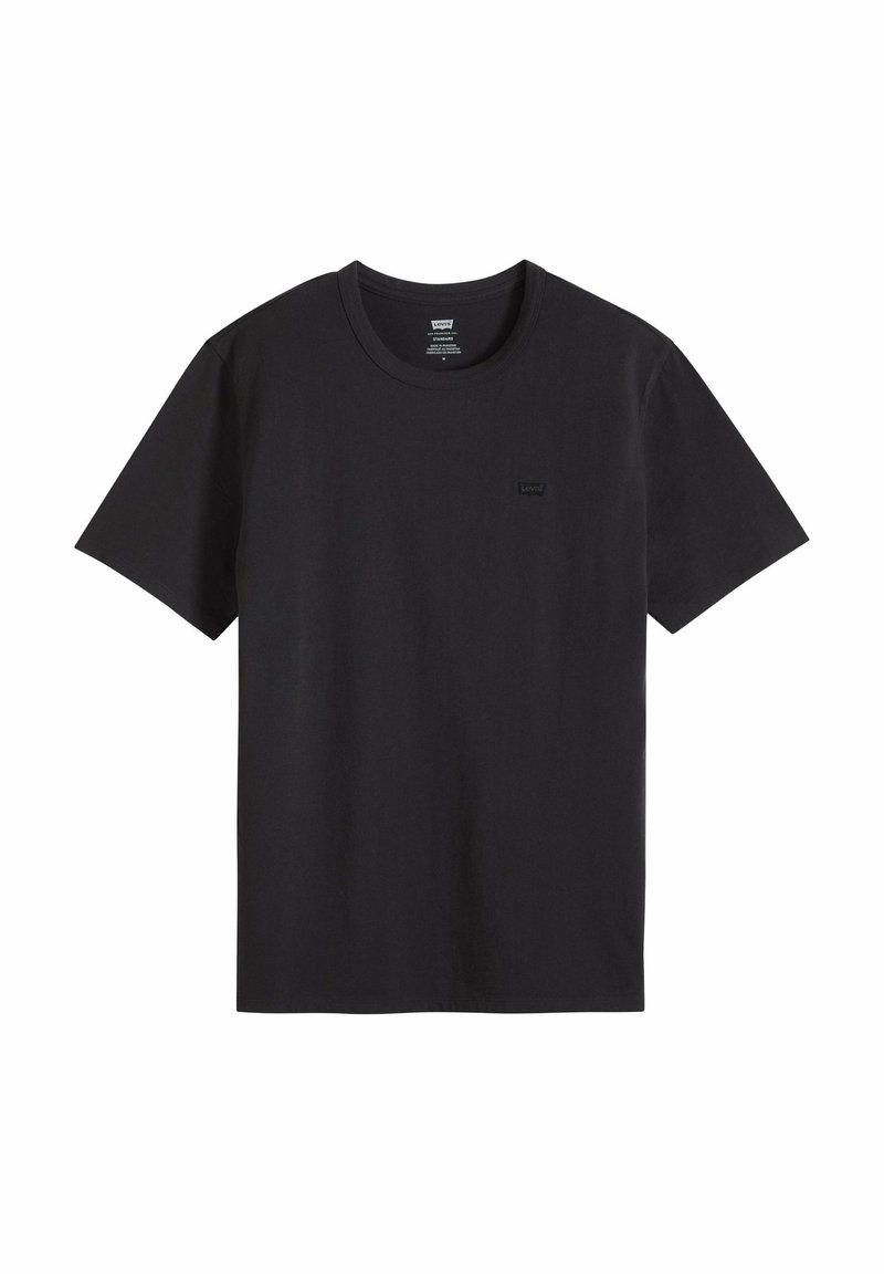 Camiseta negra de manga corta con cuello redondo y pequeño parche con el logo de Levi's en el pecho izquierdo, presentada sobre fondo blanco.