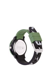 Grüne Silikon-Uhr mit einem schwarzen Armband, das ein weißes Tiermotiv aufweist. Gehäuseboden aus rostfreiem Stahl, wasserdicht bis 30 Meter.