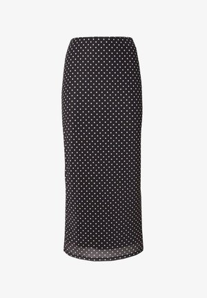 Schwarzer Pünktchen-Midi-Rock aus leichtem Stoff, mit figurbetonter Form und glatter Textur. Der Saum endet knapp unterhalb des Knies.