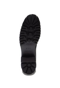 Suola in gomma nera con texture rigata, indentazioni circolari e tacco piatto. Le marcature includono "VDP" e "MADE IN ITALY." Taglia 37.