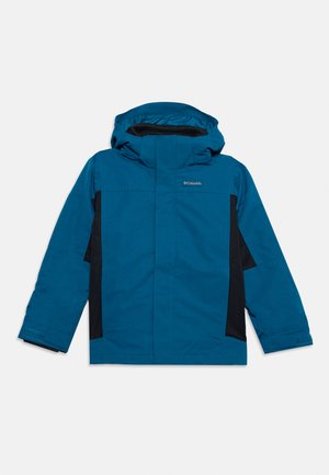 Veste d'hiver Columbia bleu et noir avec capuche, manches longues et bracelets velcro aux poignets, montrée sur fond blanc.