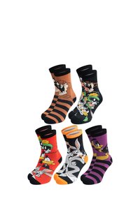 Tre paia di calzini grafici: arancioni con strisce nere e stampa di personaggi, neri con disegni di cartoni colorati e viola con strisce a contrasto.
