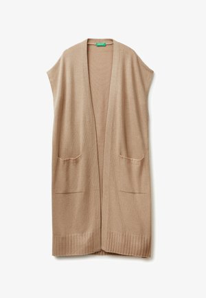 Beżowy bezrękawnik z miękkiego materiału, z otwartym przodem, dwoma przednimi kieszeniami oraz prążkowanym wykończeniem dla tekstury.