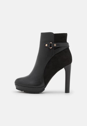 Bottines à talons hauts - black