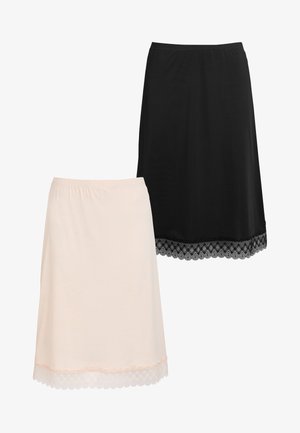 Two skirts: one black and one pale pink. Black skirt features a textured lace trim, while the pink has a scalloped lace edge. Elastic waistbands.