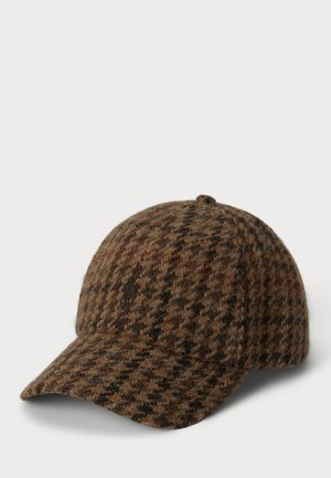 Căciulă dintr-un amestec de lână, de culoare maro, cu un model houndstooth, boruri curve și logo brodat pe partea din față. Textură moale cu detalii de cusătură proeminente.