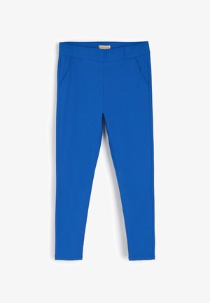 Jasnoniebieskie legginsy wykonane z elastycznej tkaniny z elastycznym pasem i dwoma bocznymi kieszeniami. Gładka tekstura i slim fit.