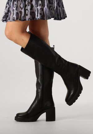 Black knee-high leather boots with a chunky heel, featuring a side zipper, smooth texture, and a sturdy rubber outsole.