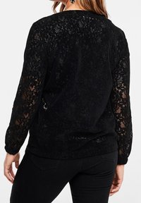 Triangle Strickjacke - black