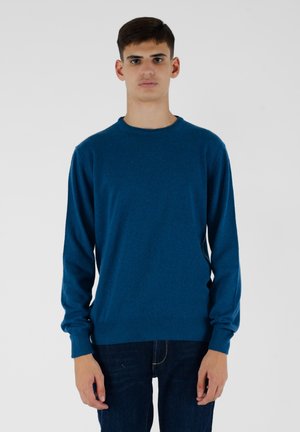 - Sweter