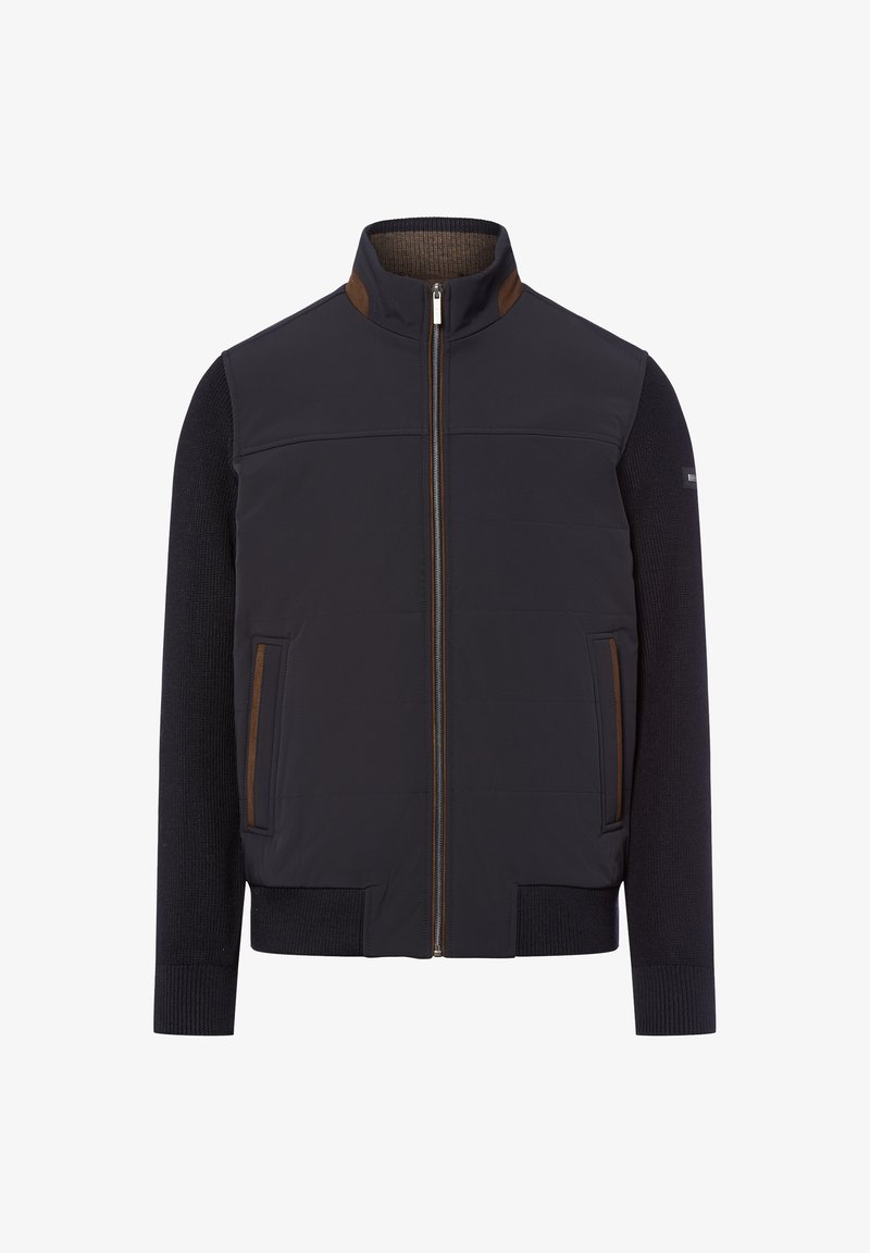 Męska kurtka z zamkiem z przodu, pikowana w ciemnoniebieskim kolorze, z teksturowanymi rękawami. Udekorowana brązowymi detalami na ramionach i kieszeniach.