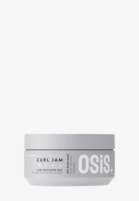 OSiS+ Curl Jam lockdefinierande gel i en grå behållare. Rund form, slät konsistens, med svart och vit text och ett skruvlock.