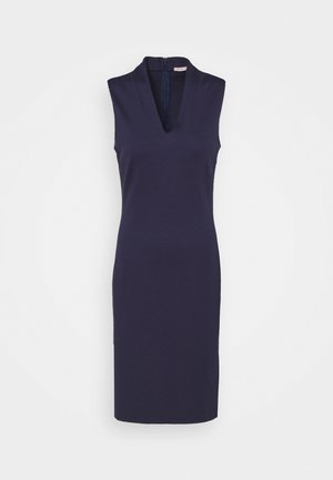 Ärmelloses knielanges Kleid in Marineblau mit tiefem V-Ausschnitt und Reißverschluss am Rücken, figurbetonte Silhouette und schlichtes Design.