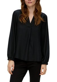 Schwarze Bluse mit langen Ärmeln und V-Ausschnitt, aus glattem Stoff, mit gerafften Manschetten und lockerer Passform für angenehmes Tragen.