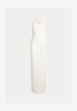 Λευκό φόρεμα αμάνικο, μήκους μέχρι το πάτωμα, με στριφογυρισμένους ιμάντες που διασταυρώνονται στον λαιμό, ευθεία σιλουέτα, απαλό ύφασμα.