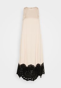 Robe maxi sans manches en tissu crème lisse, ornée d'un ourlet en dentelle noire avec des motifs floraux découpés délicats.