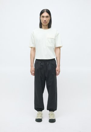 DIVISIONAL PANTS - Pantalon de survêtement - phantom