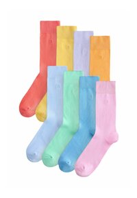 Ocho pares de calcetines de algod�ón en colores pastel: coral, amarillo, lavanda, naranja, menta, azul claro, verde azulado y rosa; puños acanalados.