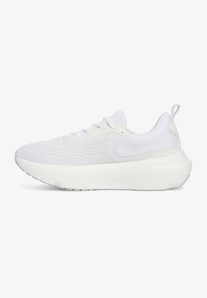 White athletic shoes featuring a textured mesh upper, thick ridged sole, and padded collar. Side logo embossed for branding.