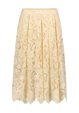 Jupe en dentelle jaune clair avec motifs floraux, design plissé, ourlet festonné et texture transparente. Matière douce avec des détails complexes.