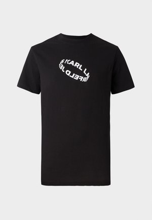 Black cotton t-shirt with short sleeves and a crew neck. Features a white, distorted logo text printed on the front.